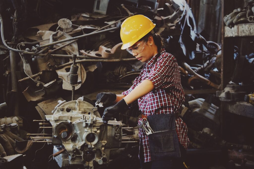 woman working on a machine